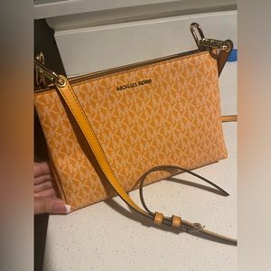 Michael Kors yellow crossbody bag with gold fixtures